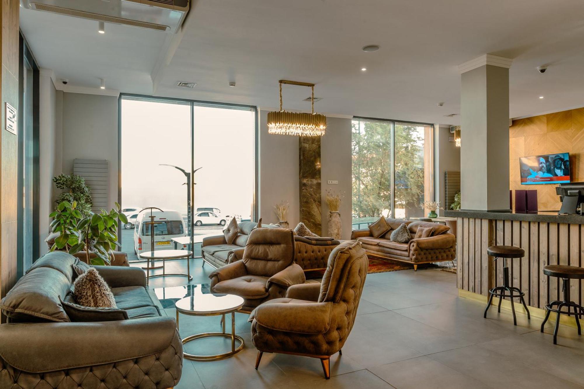 Infinity Plaza Block 1 Hotel Atyrau Bagian luar foto